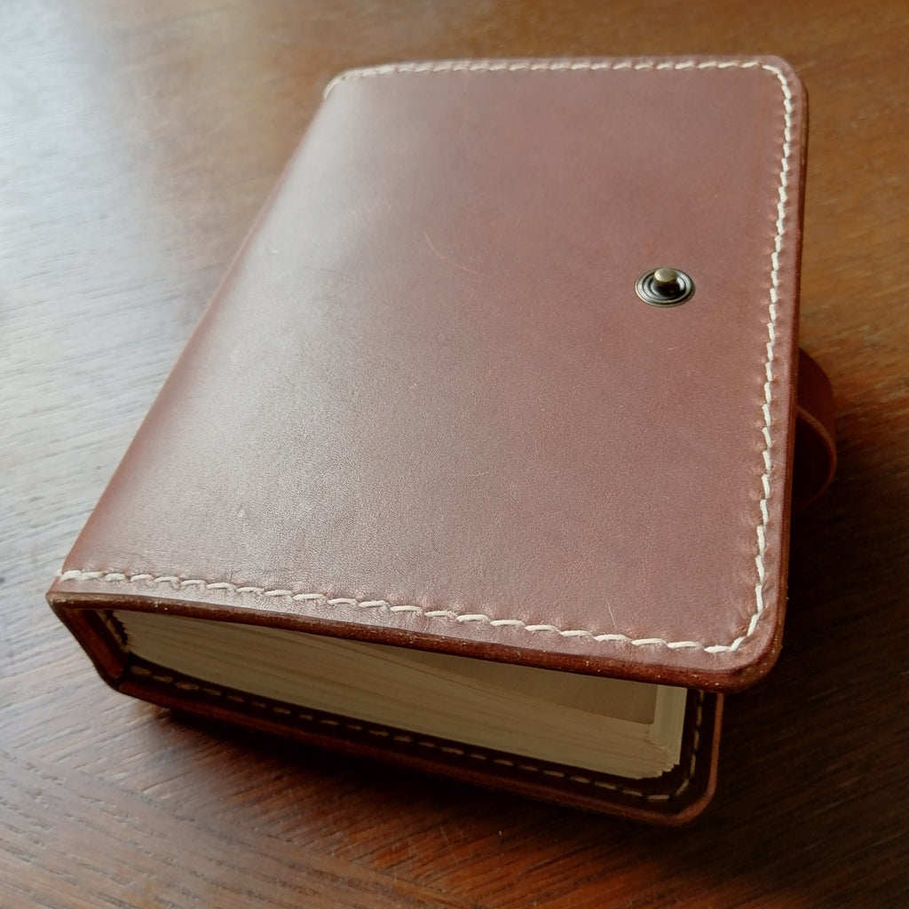 A6 notebook with snap closure